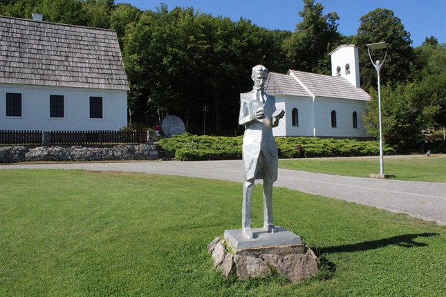 Statue of Nikola Tesla in front of his birth house